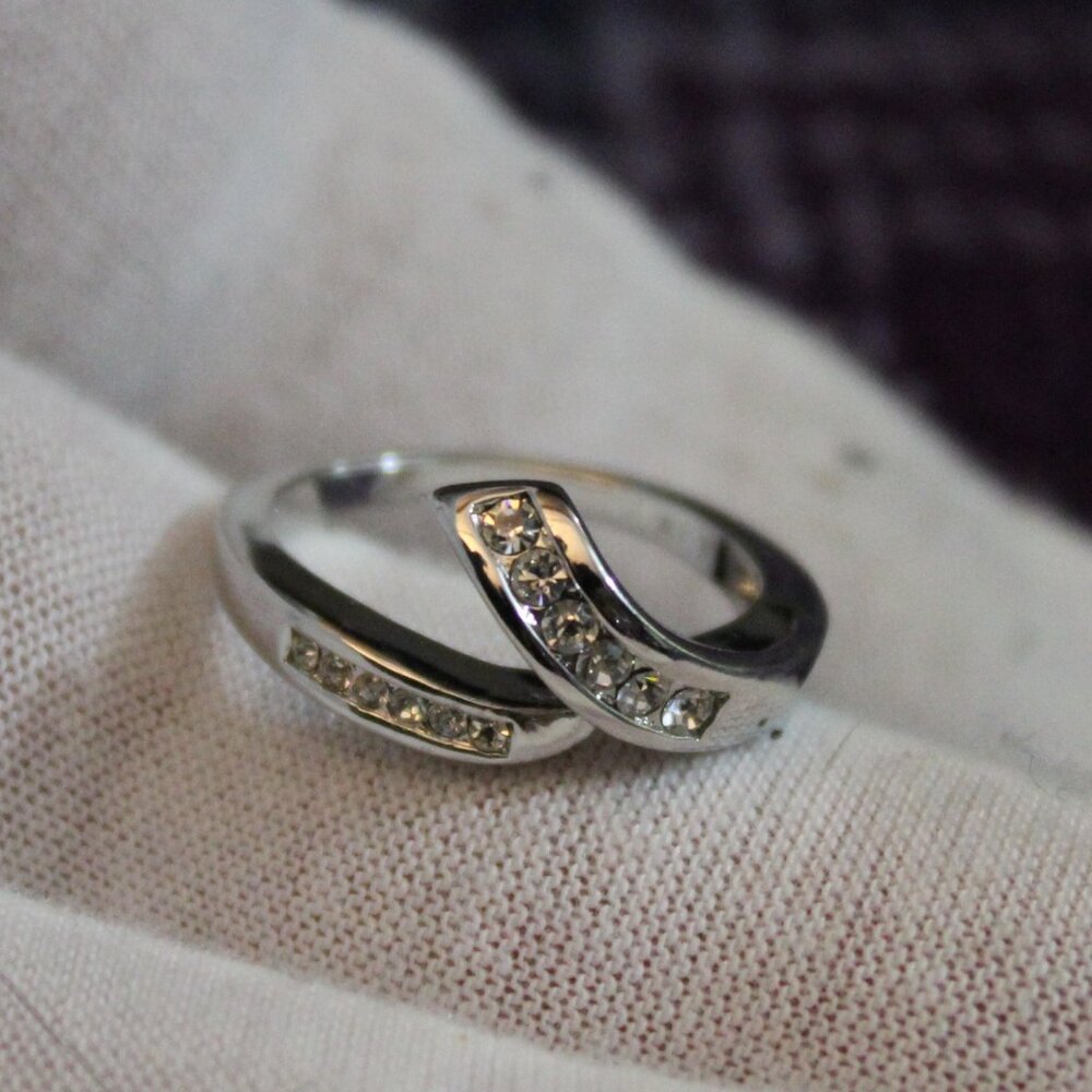 Avon Silver Tone  White Rhinestone Swoosh Ring